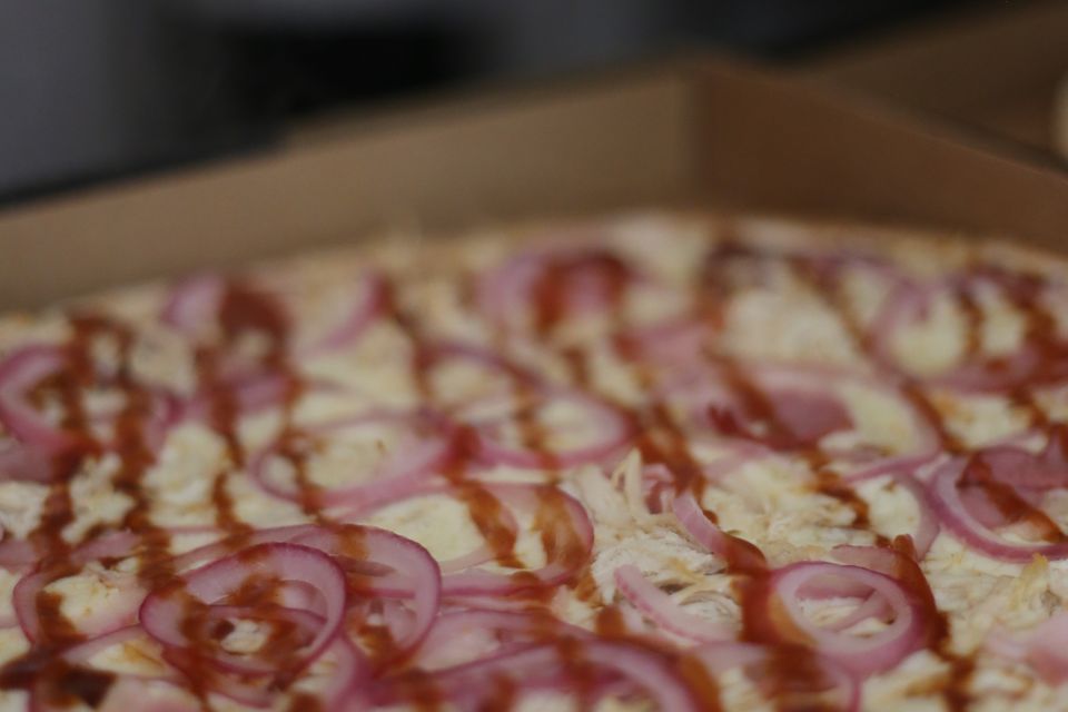 Pizza numa caixa de take away